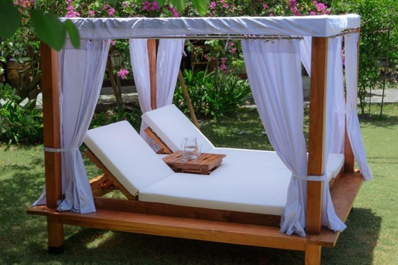 Convierte tu jardín en un chill out con una cama balinesa
